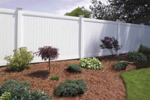 garden with vinyl fencing